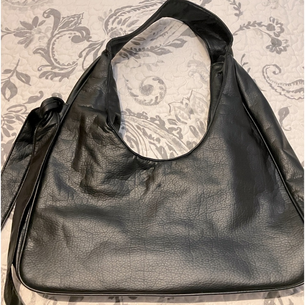 Cute leather black bag.